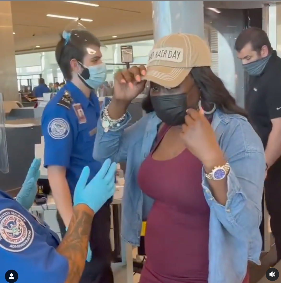 Brinta was asked by airport security to show what was underneath her hat, which was her wig cap.