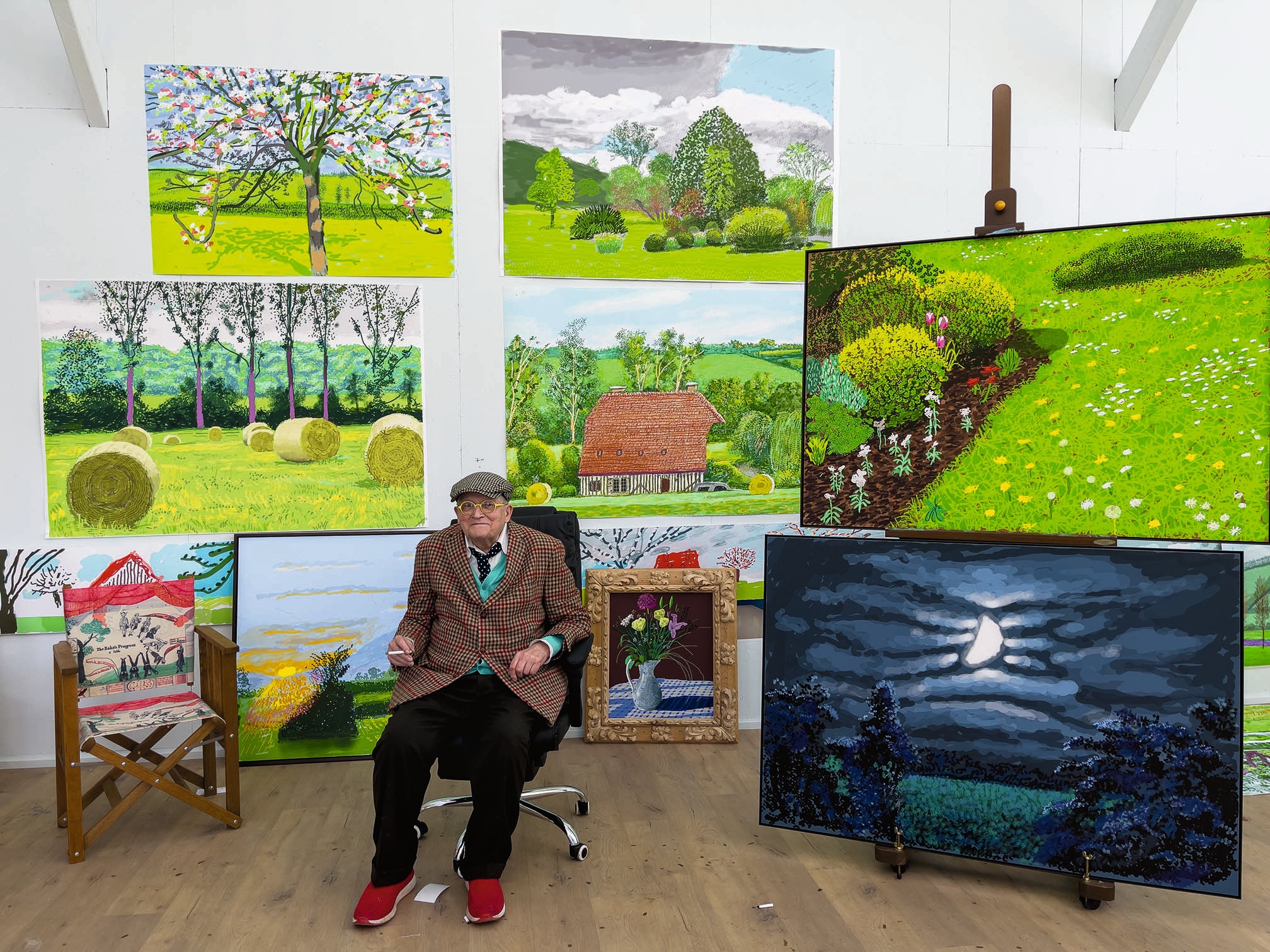 David Hockney in his Normandy studio earlier this year with his latest iPad landscapes that are going on show at the RA next week