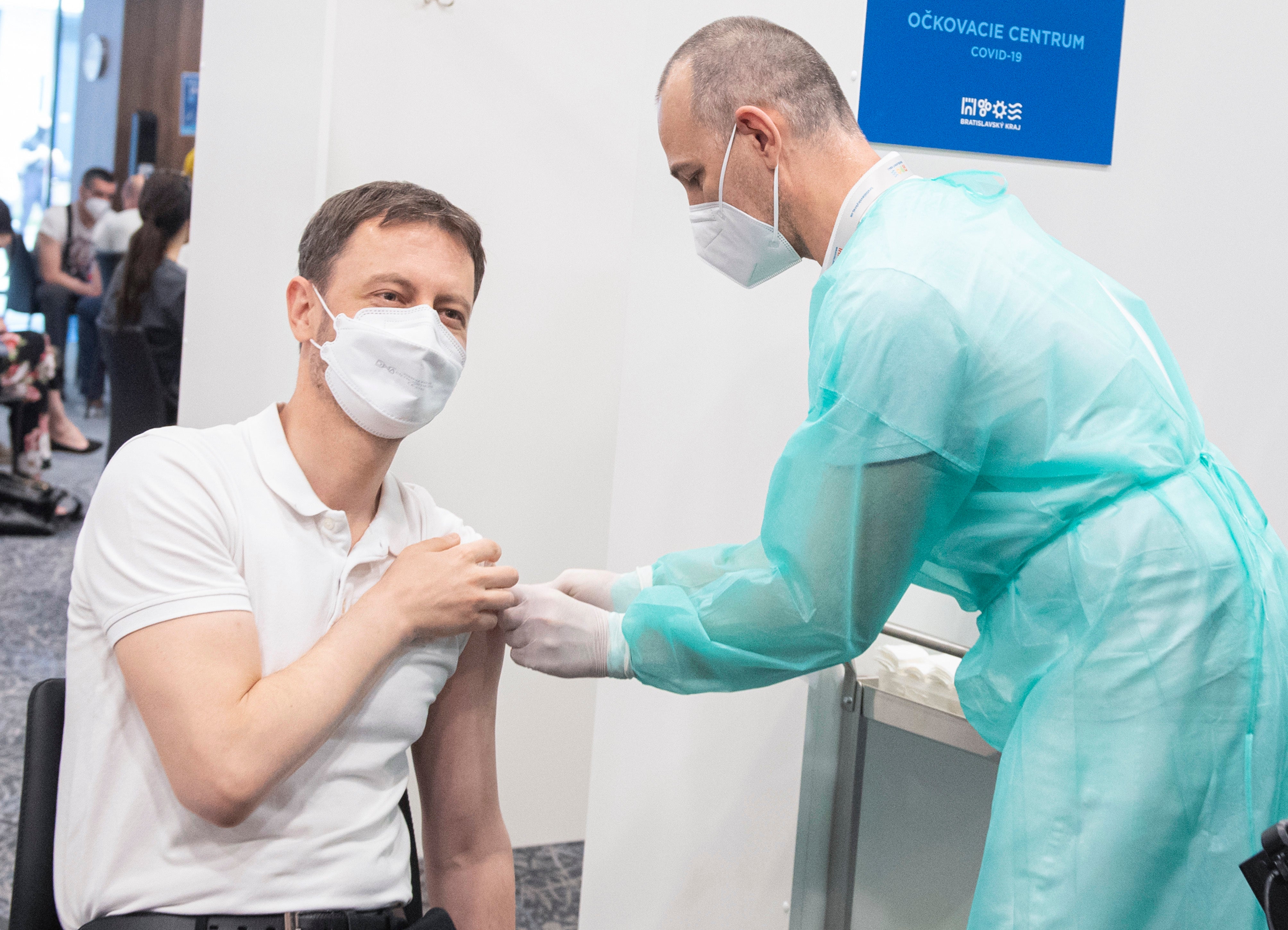 Slovakia's Prime Minister Eduard Heger receives his first AstraZeneca COVID-19 vaccination at the National Soccer Stadium in Bratislava