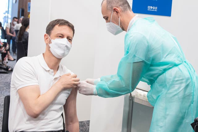<p>Slovakia's Prime Minister Eduard Heger receives his first AstraZeneca COVID-19 vaccination at the National Soccer Stadium in Bratislava</p>