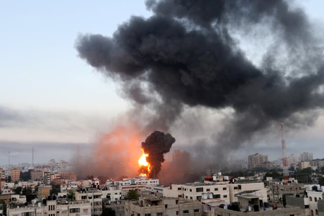 <p>Smoke and flames rise following Israeli airstrikes in Gaza</p>