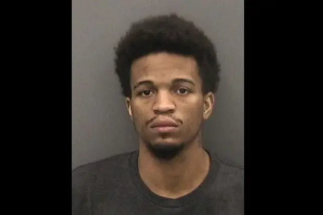 Corey Pujols, 27, is charged with aggravated manslaughter after allegedly punching an elderly customer at Dunkin Donuts who reportedly called him a racial slur
