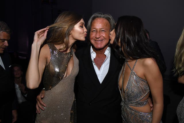 <p>Gigi Hadid, Mohamed Hadid and Bella Hadid attend the Victoria's Secret After Party at the Grand Palais on November 30, 2016 in Paris, France</p>