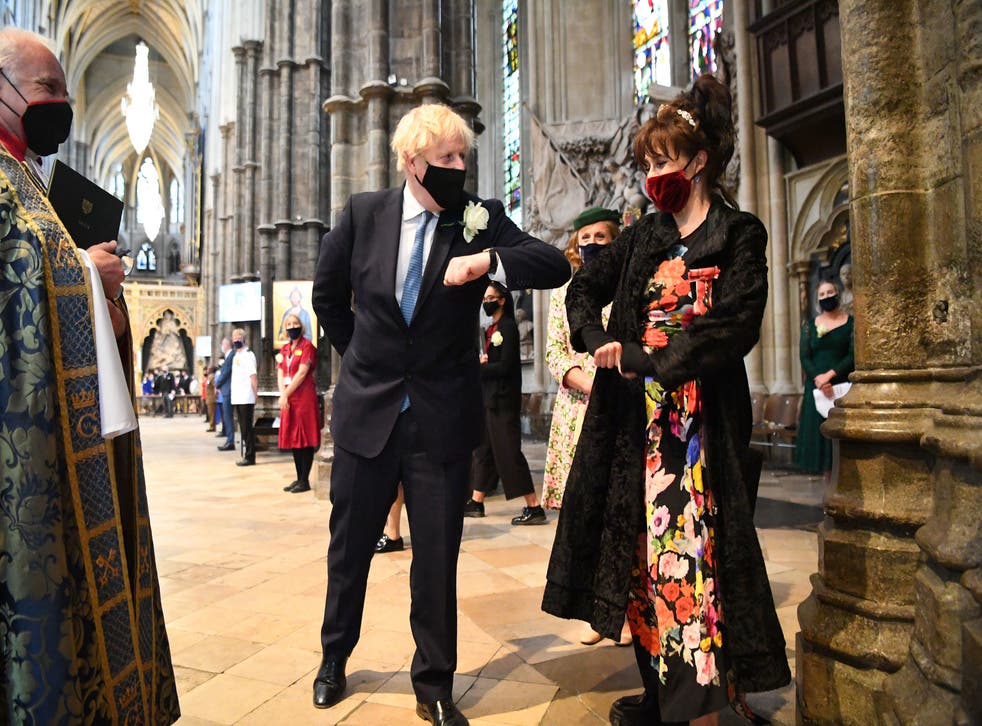 Bonham Carter bumps elbows with Boris Johnson at Westminster Abbey’s annual service for the Florence Nightingale Foundation