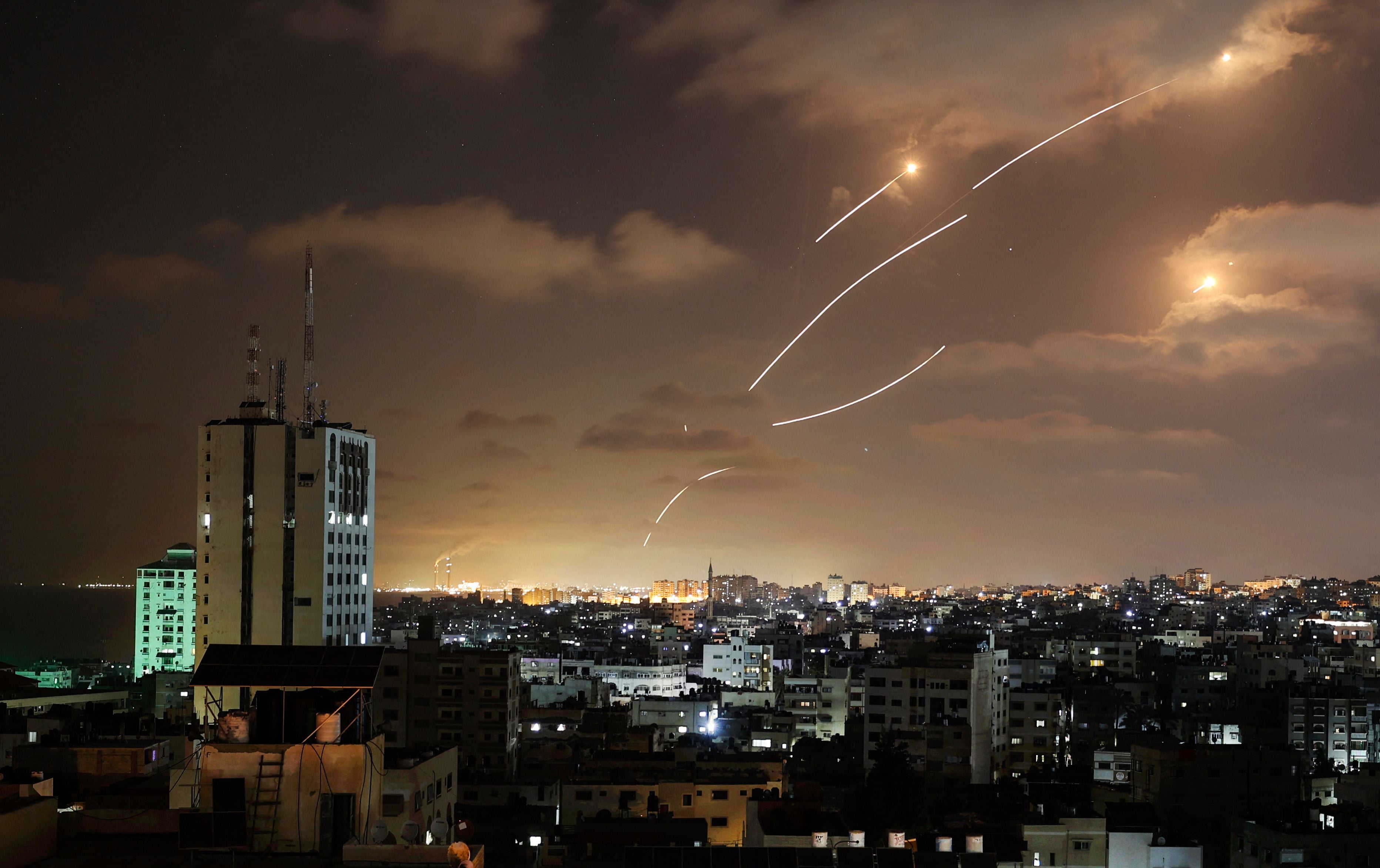 Rockets launched from the Gaza Strip, controlled by the Palestinian Hamas movement, are intercepted by Israel's Iron Dome aerial defence system