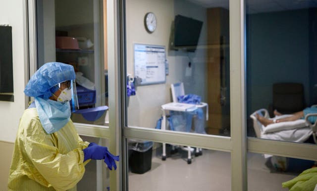 <p>Representative: A healthcare worker looks into  transfer a patient from Humber River Hospital's Intensive Care Unit to a waiting air ambulance as the hospital frees up space In their ICU unit, in Toronto, Ontario, Canada, on 28 April 2021</p>