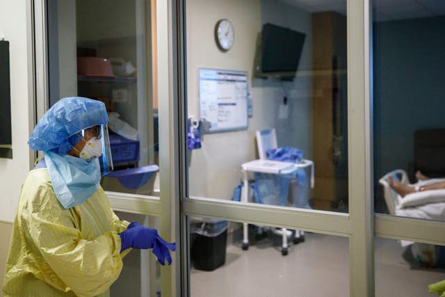 <p>Representative: A healthcare worker looks into  transfer a patient from Humber River Hospital's Intensive Care Unit to a waiting air ambulance as the hospital frees up space In their ICU unit, in Toronto, Ontario, Canada, on 28 April 2021</p>
