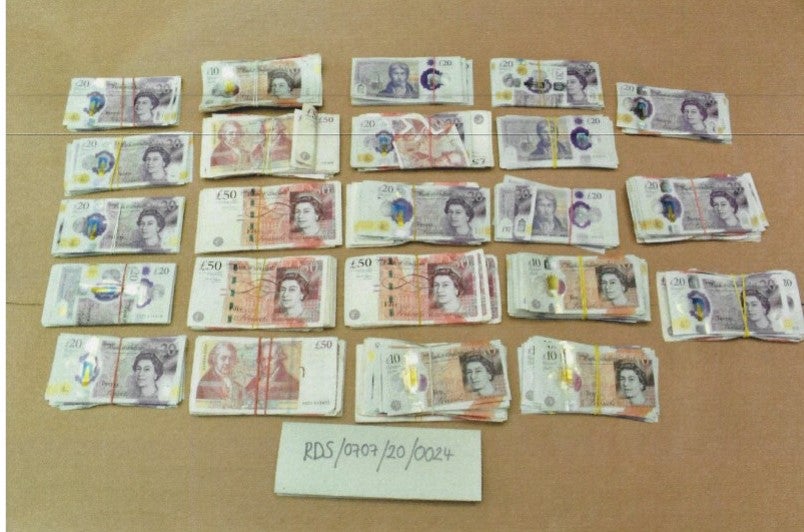 Cash found at the home of Mohsin Khan, Shazad Khan and Maria Shah