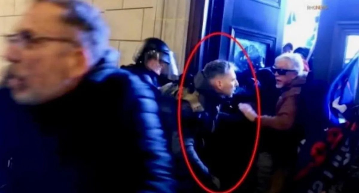 <p>Christopher Warnagiris, an active duty US Marine, pictured at the Capitol on 6 January during the an insurrection led by supporters of Donald Trump</p>