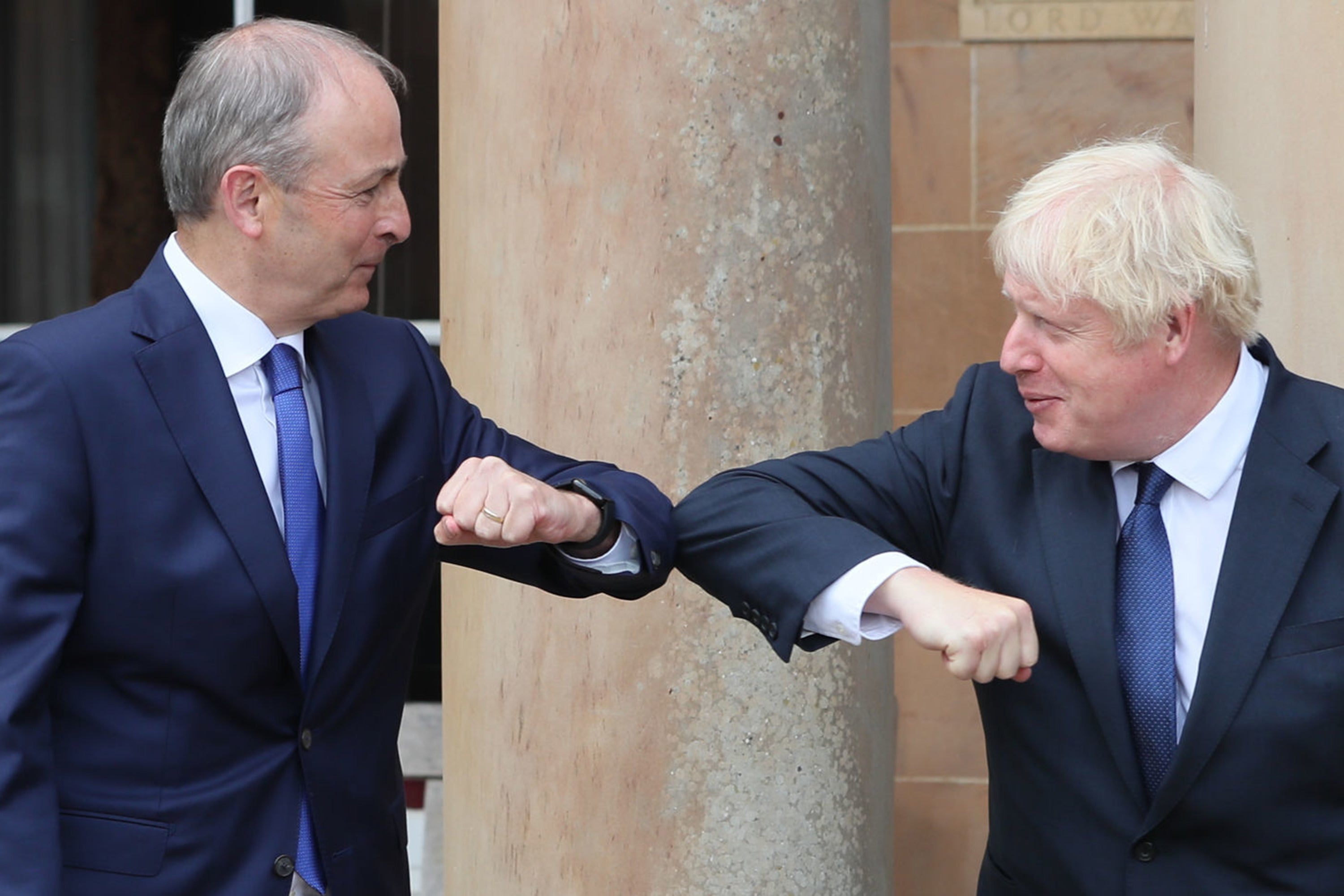 Boris Johnson (right) and Taoiseach Micheal Martin during an earlier visit to Belfast in August