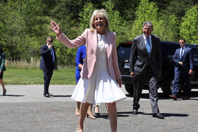 US First Lady Jill Biden waves as she greet members of the West Virginia National Guard