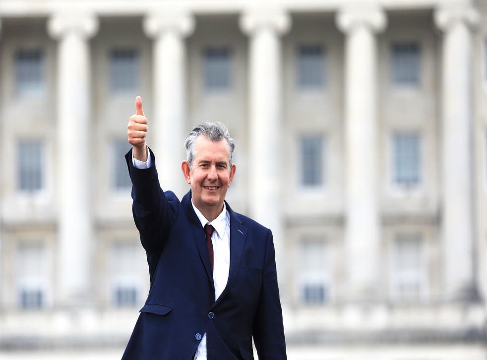 <p>Edwin Poots gives the thumbs up outside Stormont after being elected as the new party leader</p>