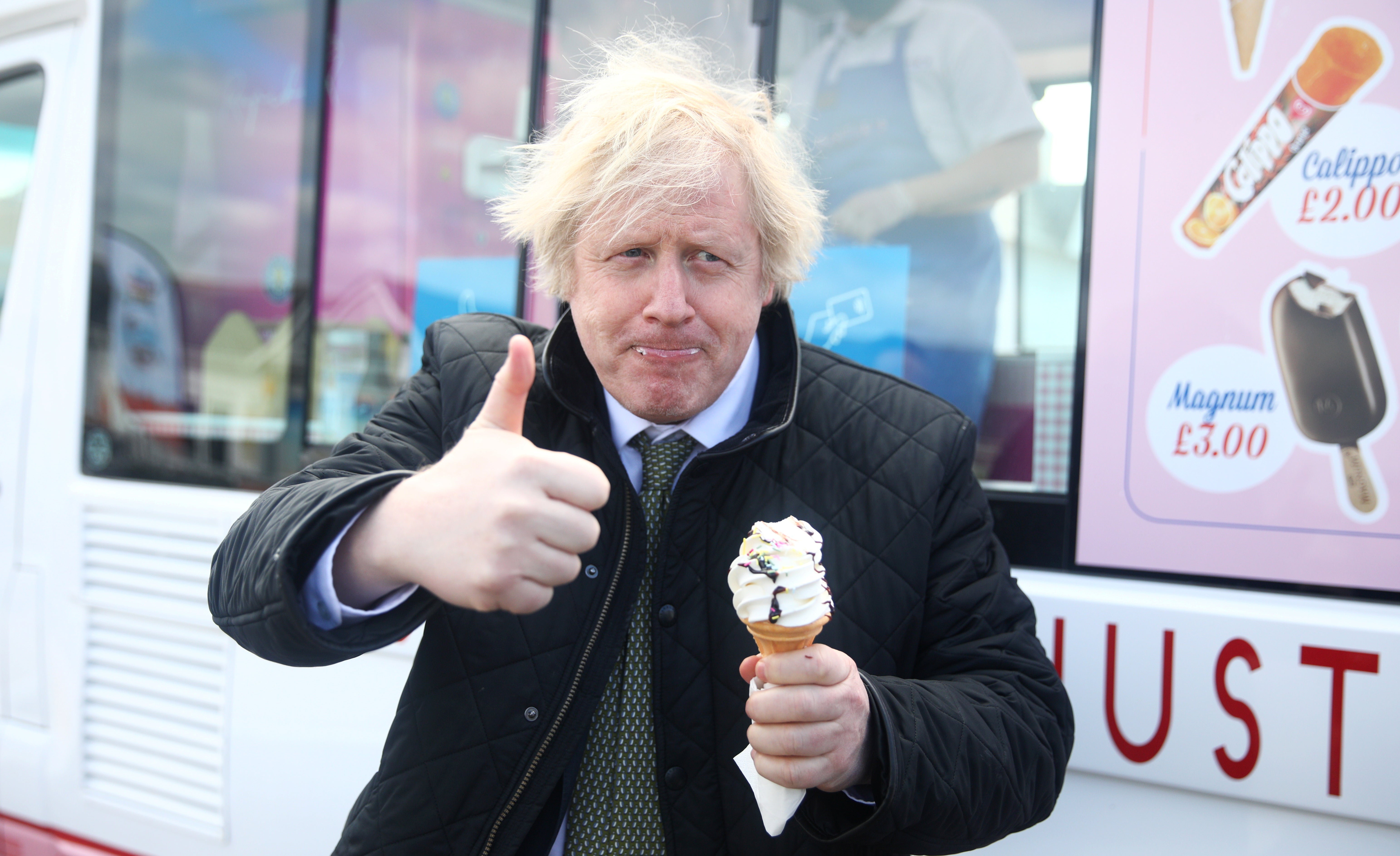 Boris Johnson, pictured here at a holiday park in Cornwall, enjoyed a trip to Mustique at cost reportedly questioned by parliamentary authorities