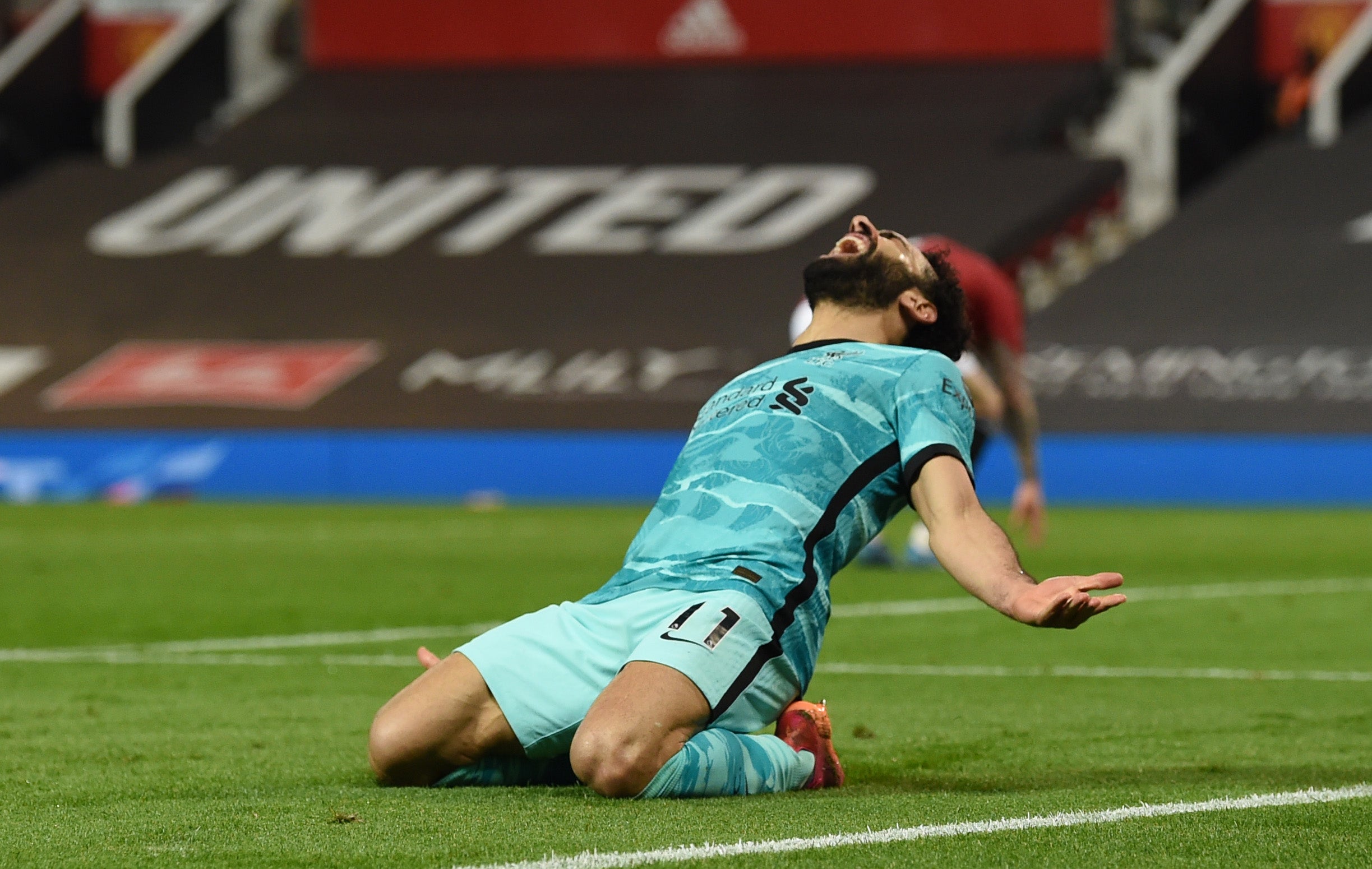 Mohamed Salah celebrates scoring against Manchester United