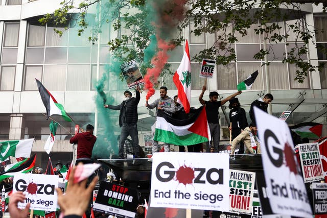 <p>Protesters at Marble Arch express solidarity with Palestine</p>