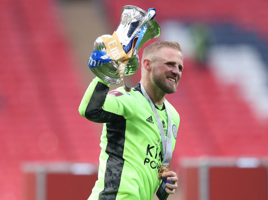 Kasper Schmeichel celebrates with the FA Cup trophy