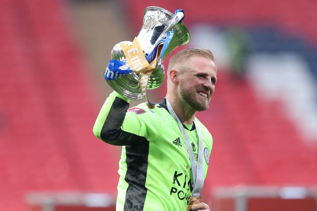 Kasper Schmeichel celebrates with the FA Cup trophy