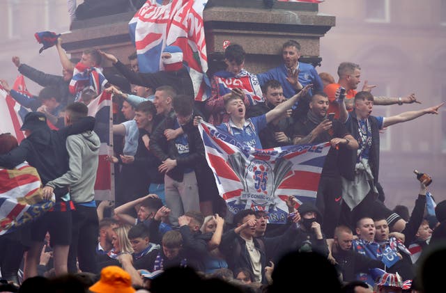 Rangers fans celebrate in George Square, Glasgow, despite a coronavius limit of 50 on public gatherings