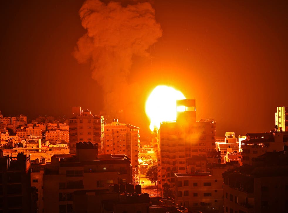 <p>An Israeli airstrike on Gaza City during the early hours of Monday</p>