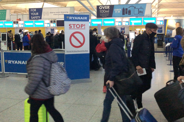 Going places: the check-in queue for Ryanair at Stansted airport
