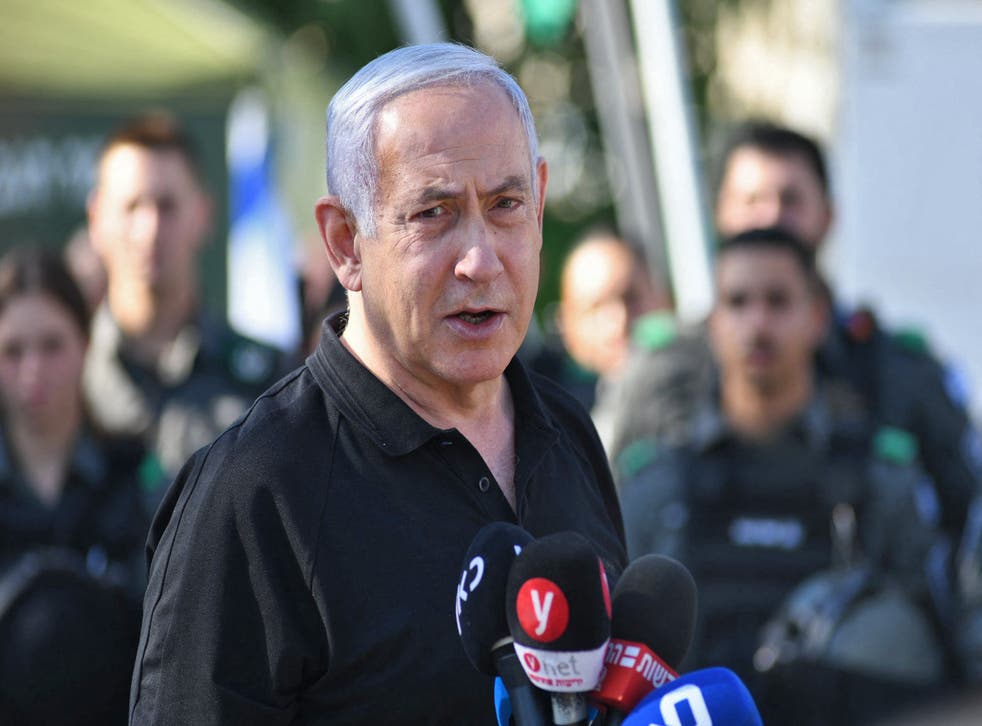 Israeli Prime Minister Benjamin Netanyahu speaks during a meeting with Israeli border police in the central city of Lod, near Tel Aviv, on 13 May, 2021. He has vowed to continue a ‘full force’ assault for ‘as long as necessary’. 