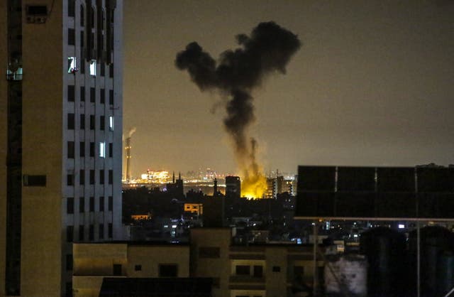 Smoke rises after an Israeli air strike hits in Gaza City