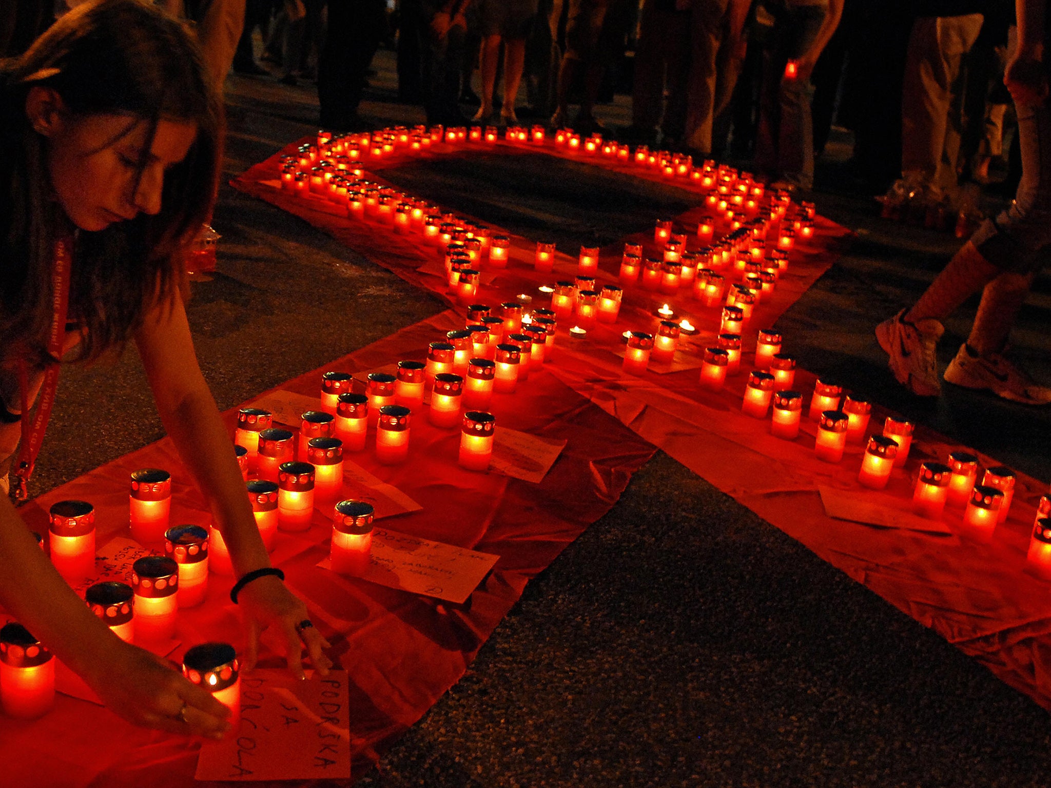 The red ribbon, seen here in Belgrade, has become a symbol for Aids around the world after O’Connell saw the PR potential of involving celebrities with their campaign