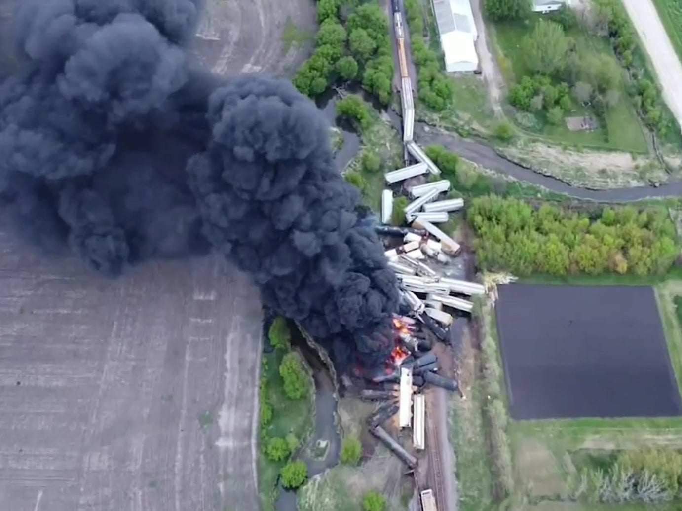 Drone footage showing the train derailment in Iowa on Sunday