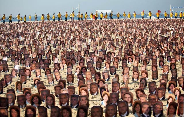 Members of the Baha'i religion demonstrate in Rio de Janeiro's Copacabana beach