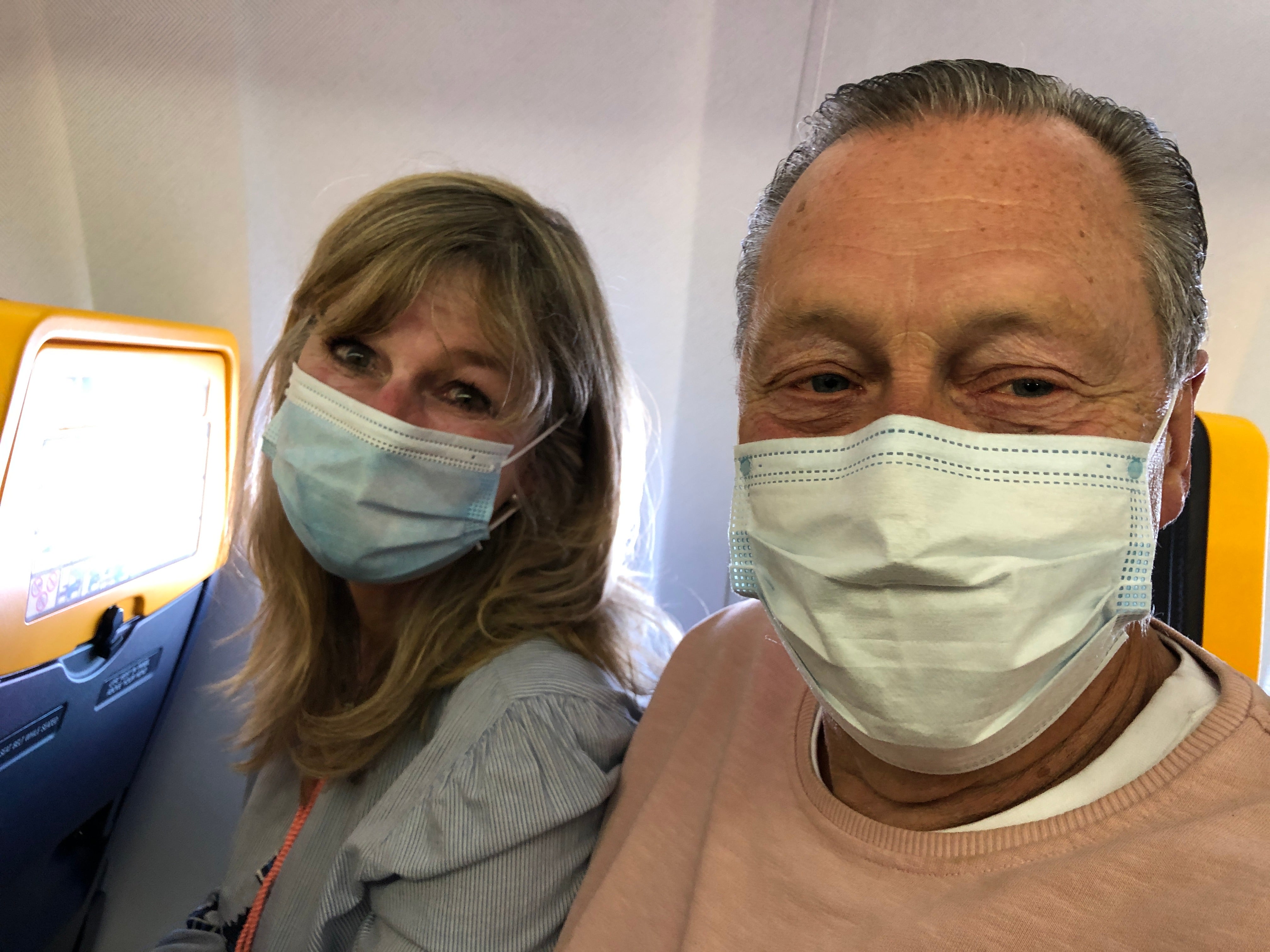 Wishful thinking: Denise Cabalier-Waffron and Geoff Watt on the flight to Faro