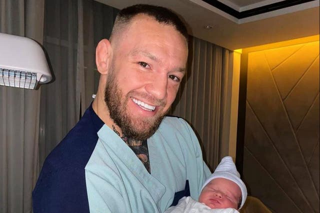 Conor McGregor with new-born son Rian
