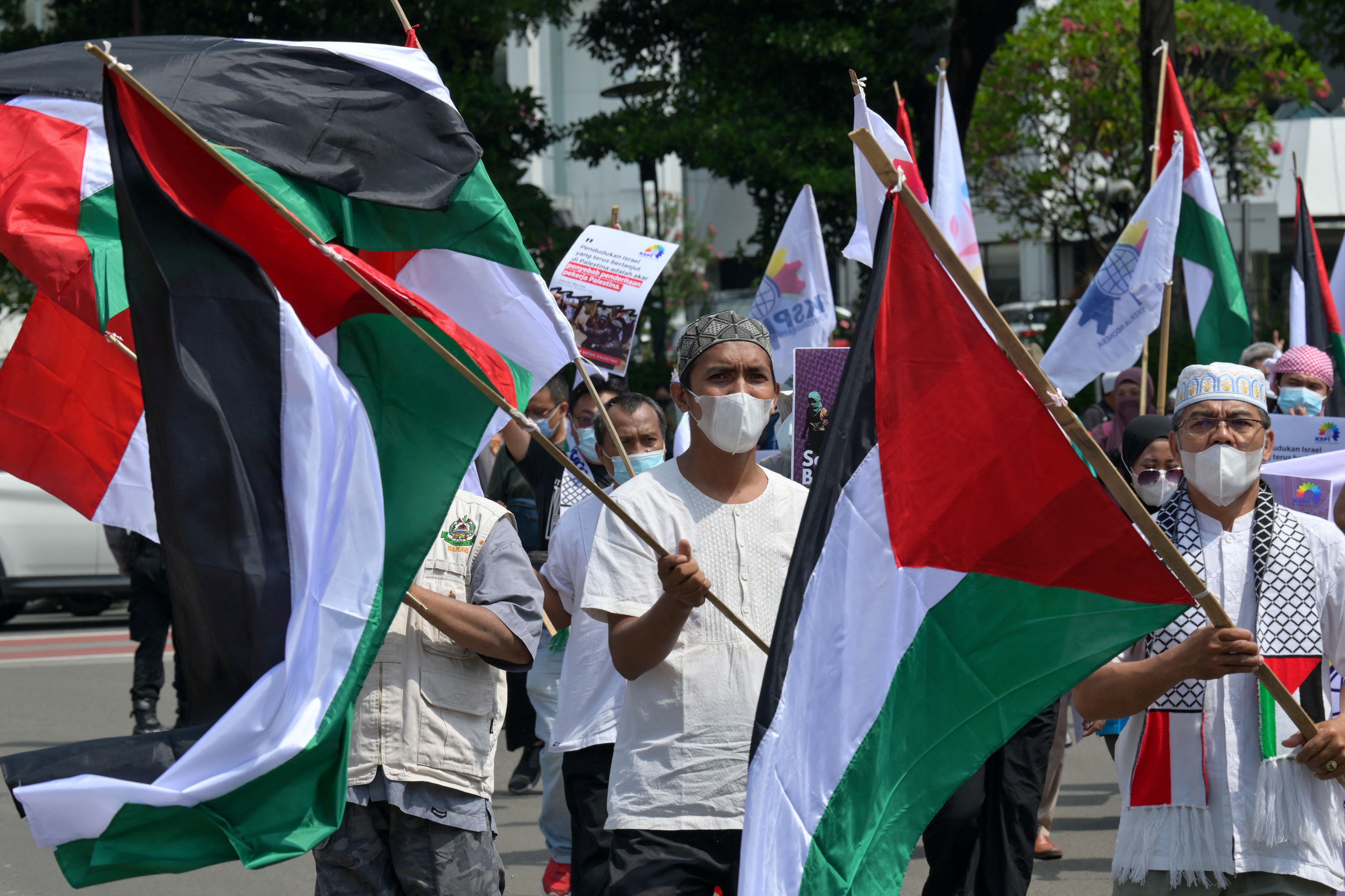 Demonstrators take part in a protest against Israel, in Jakarta on Tuesday, 18 May, 2021, amid the ongoing conflict between Israel and Hamas.