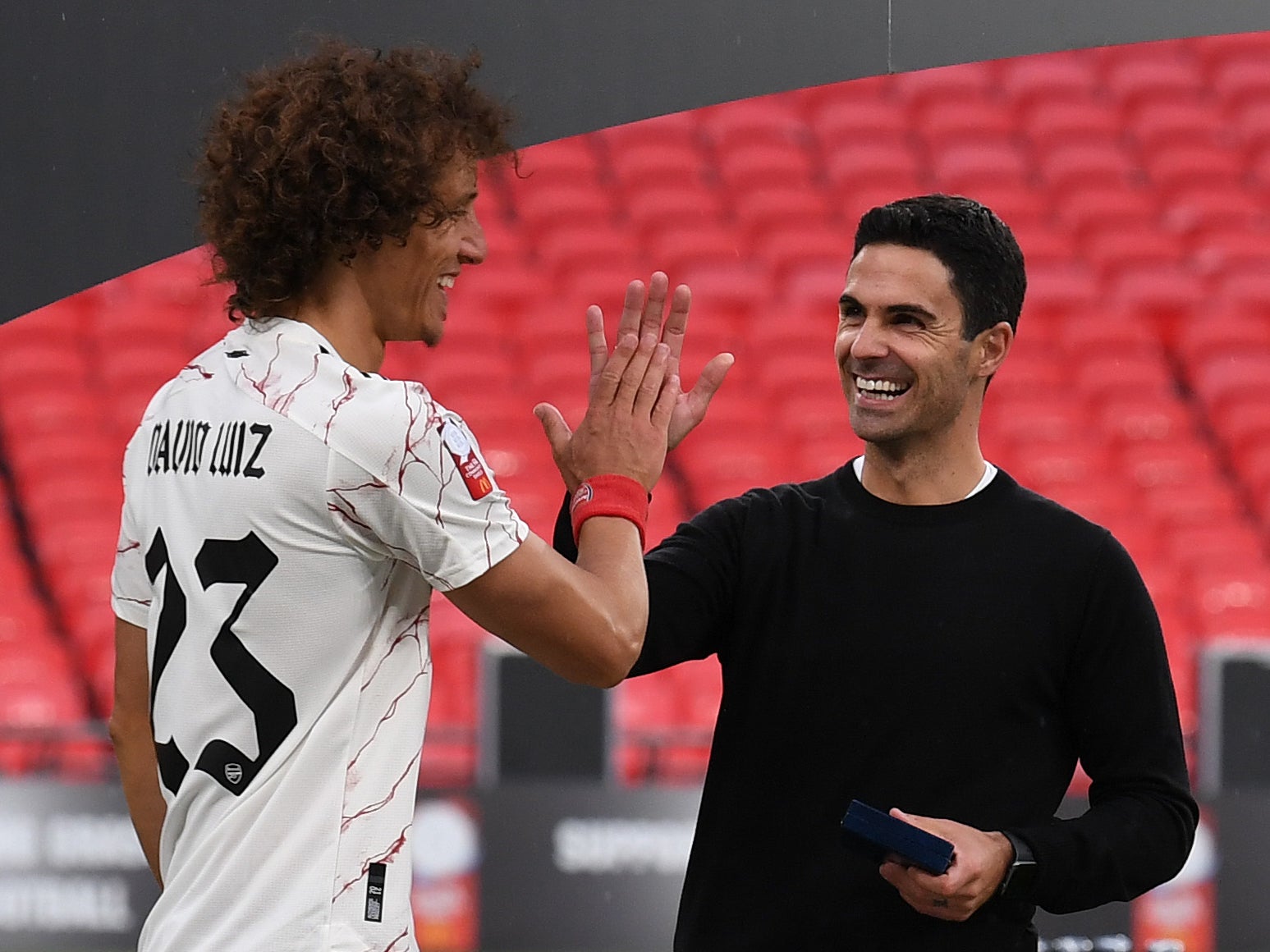 Arsenal manager Mikel Arteta and defender David Luiz
