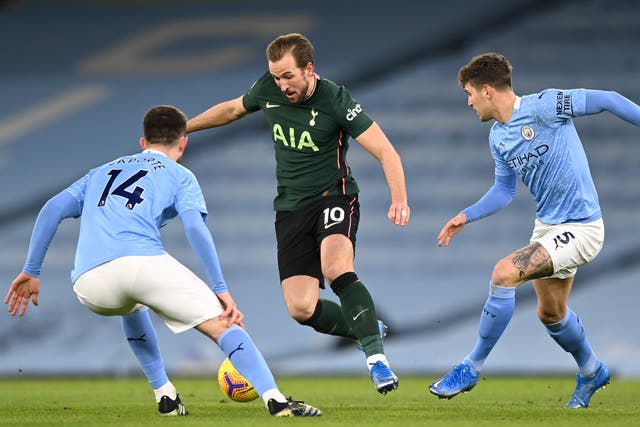 Harry Kane in action for Spurs against Manchester City