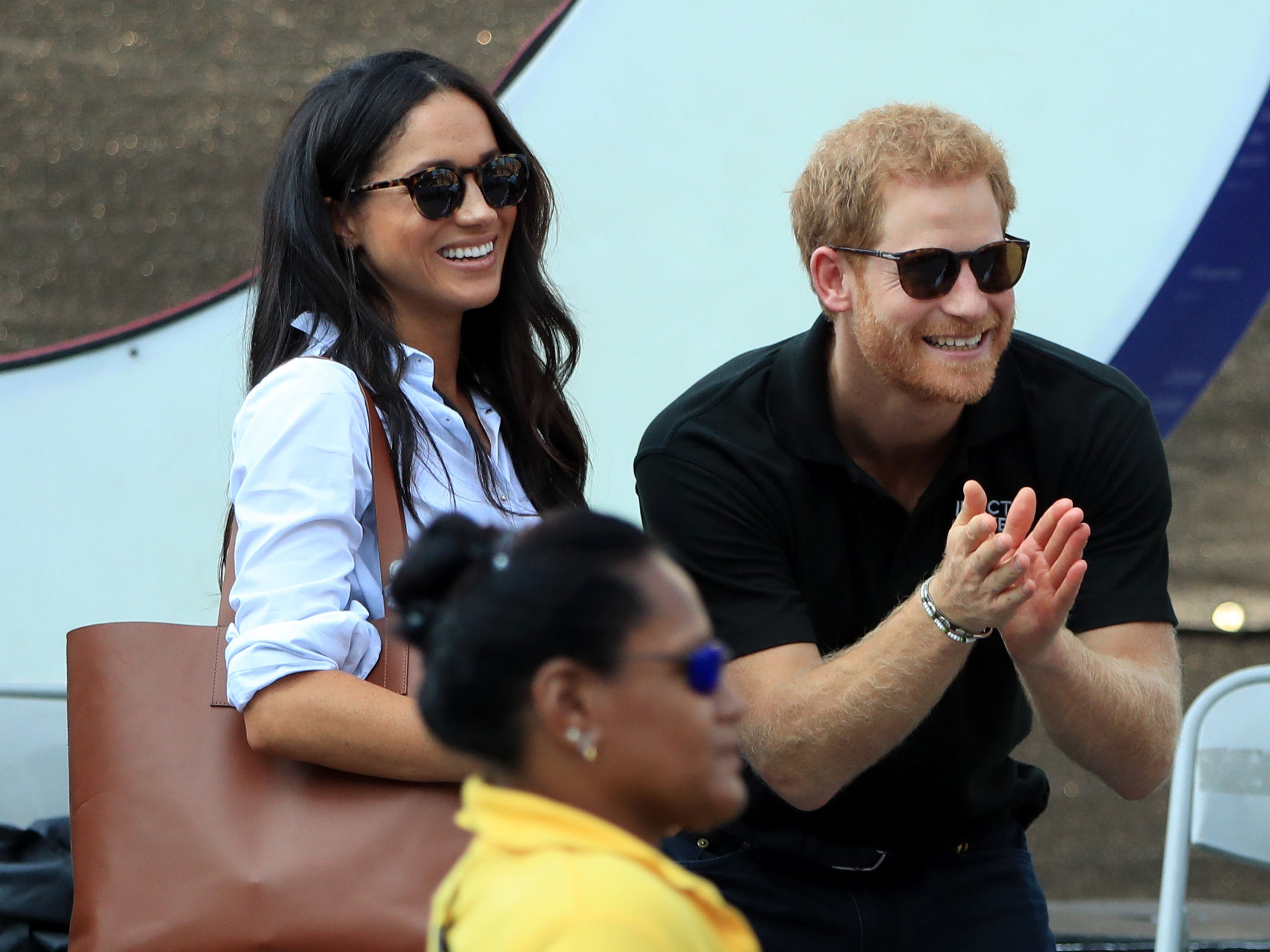 Prince Harry and Meghan Markle watch Wheelchair Tennis at the 2017 Invictus Games in Toronto, Canada