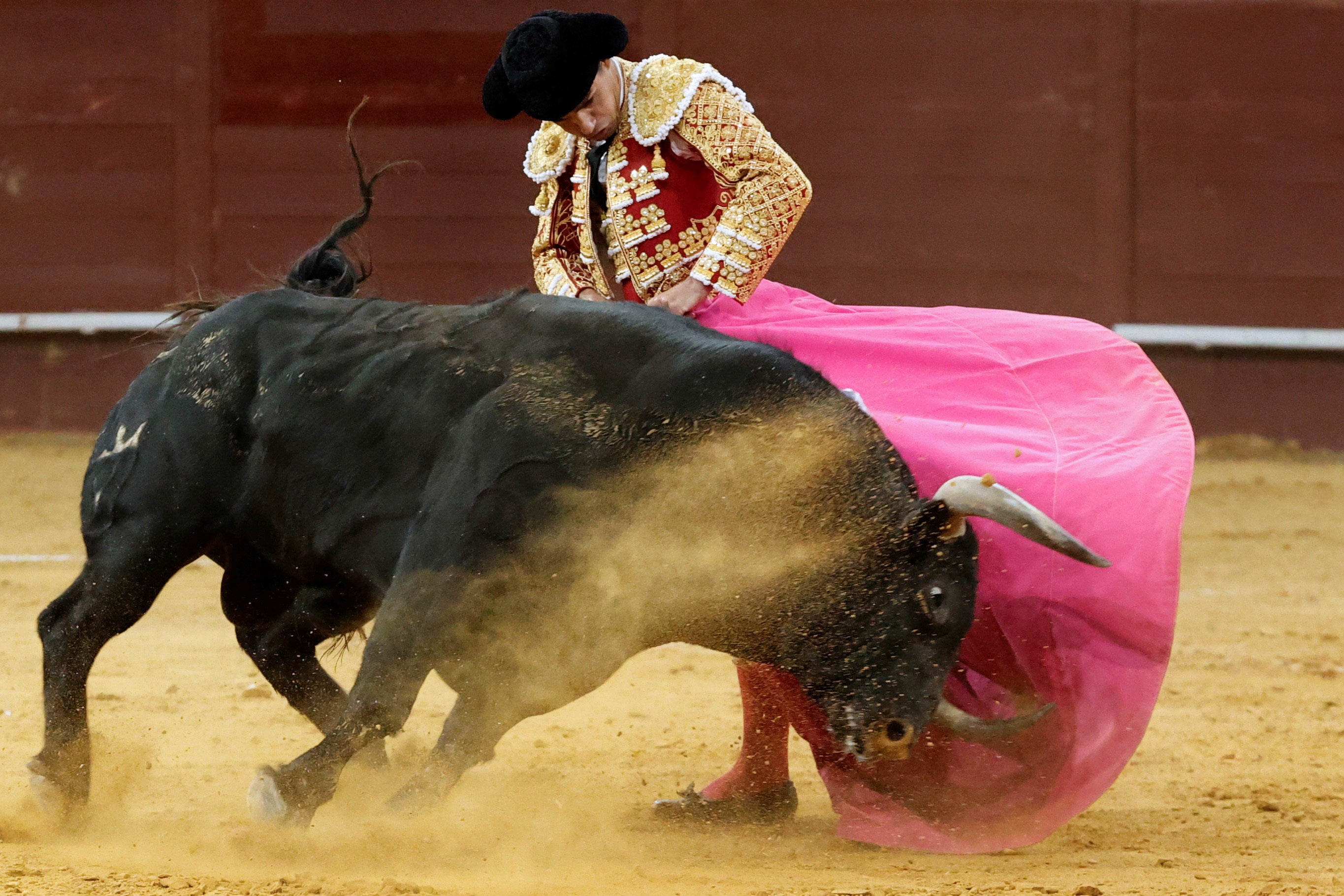 A Spanish bullfighter in action during at Vistalegre bullfighting arena, in Madrid