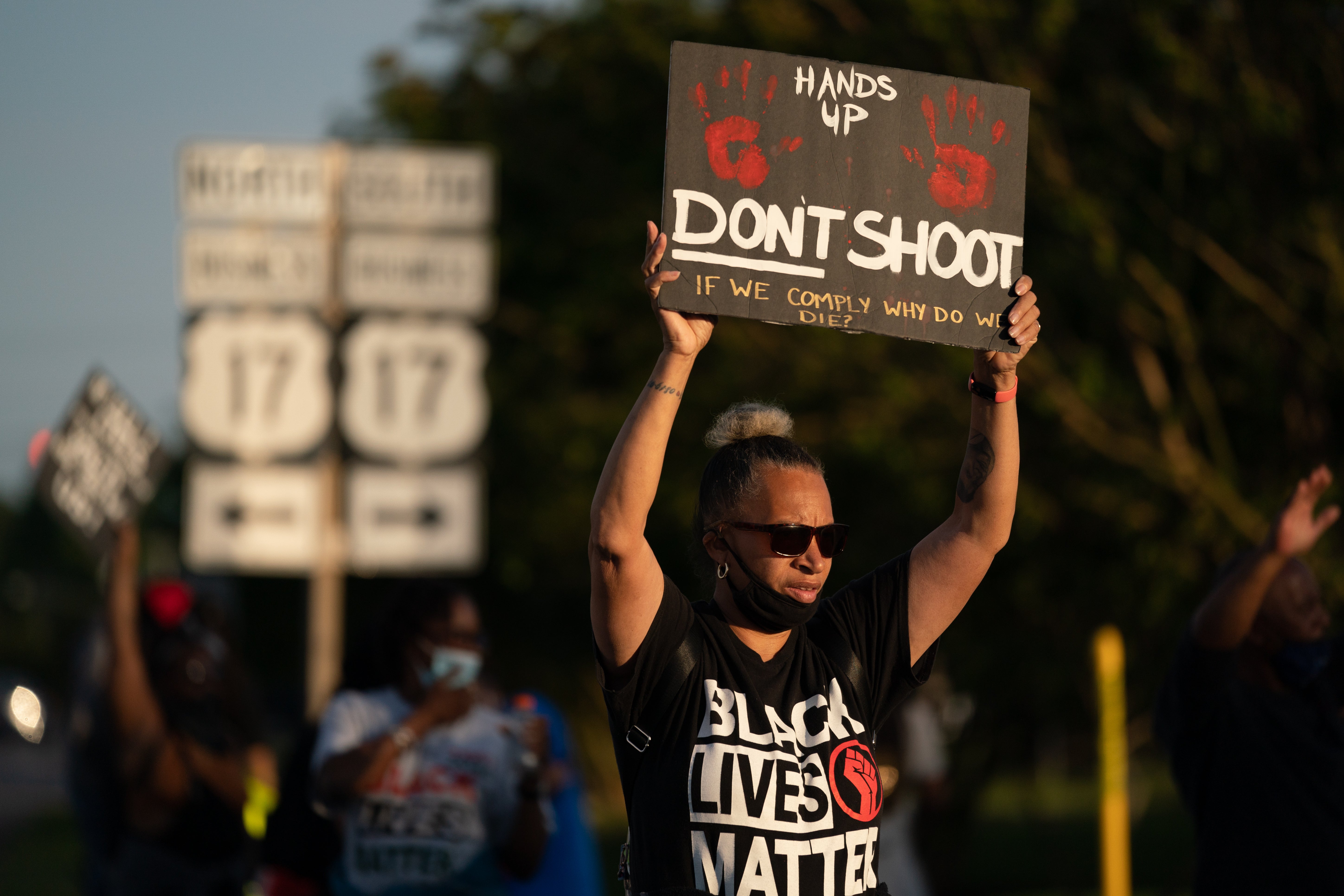 <p>ELIZABETH CITY, NC - MAY 11: Protestors march in the street after a news conference addressing police video footage of the shooting death of Andrew Brown Jr. on May 11, 2021 in Elizabeth City, North Carolina. Brown was shot and killed by officers from the Pasquotank County Sheriff's Office on April 21. </p>