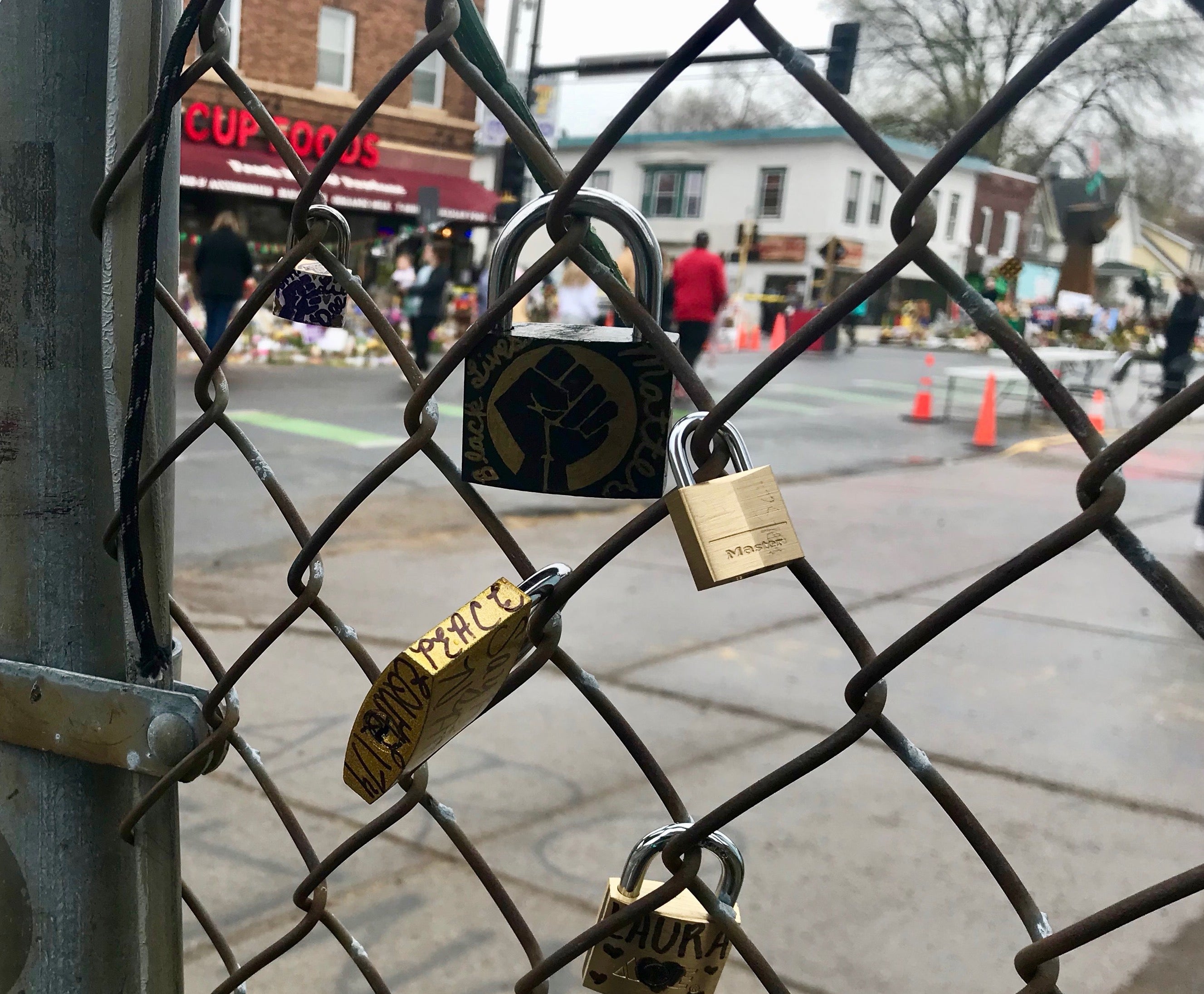 Symbol of hope: padlocks hang near where Floyd was killed
