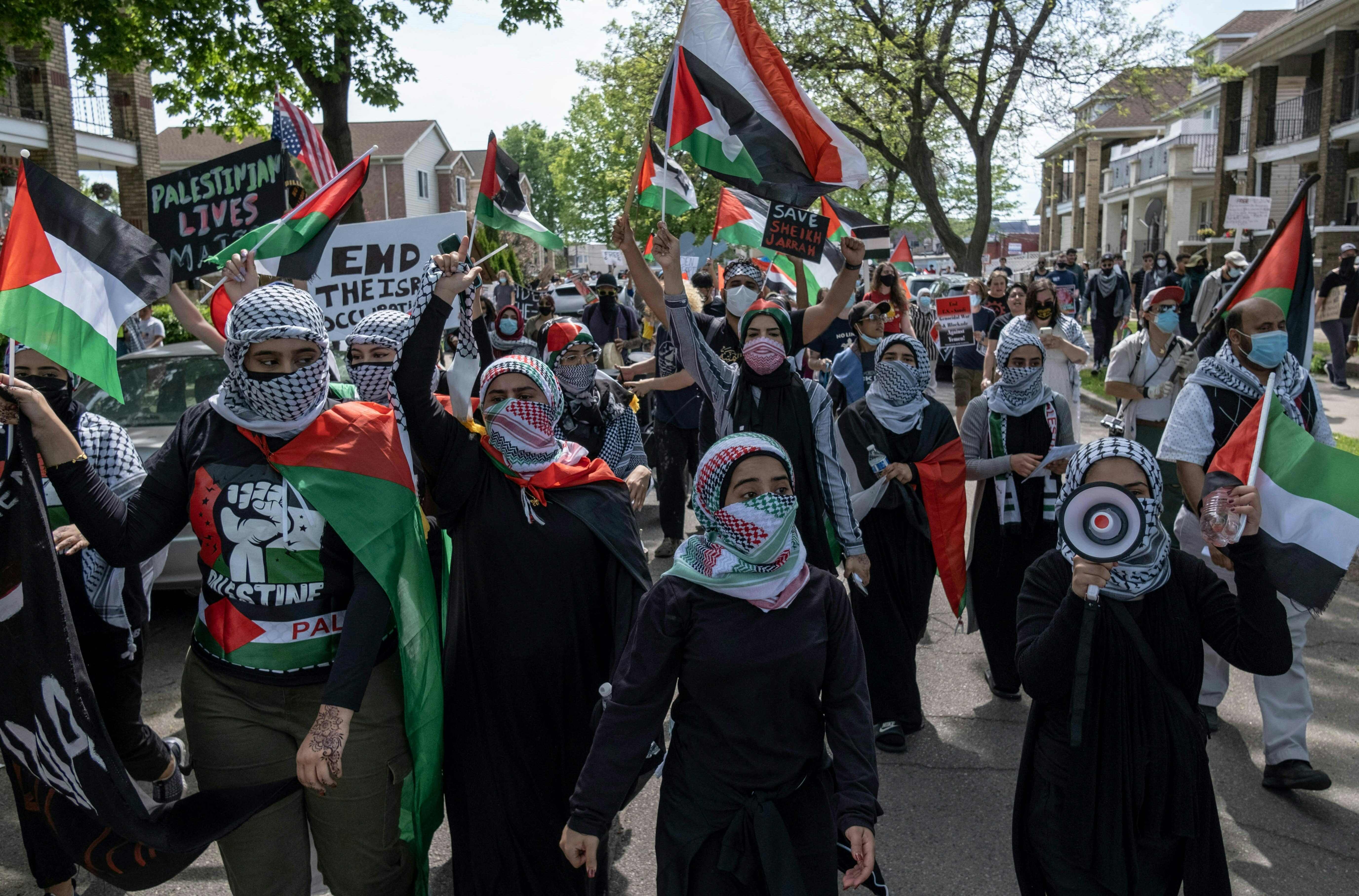 Protesters in Dearborn, Michigan protest the Biden administration’s support for Benjamin Netanyahu’s administration in Israel and the ongoing Israeli army actions in Gaza as the president tours a nearby Ford plant.