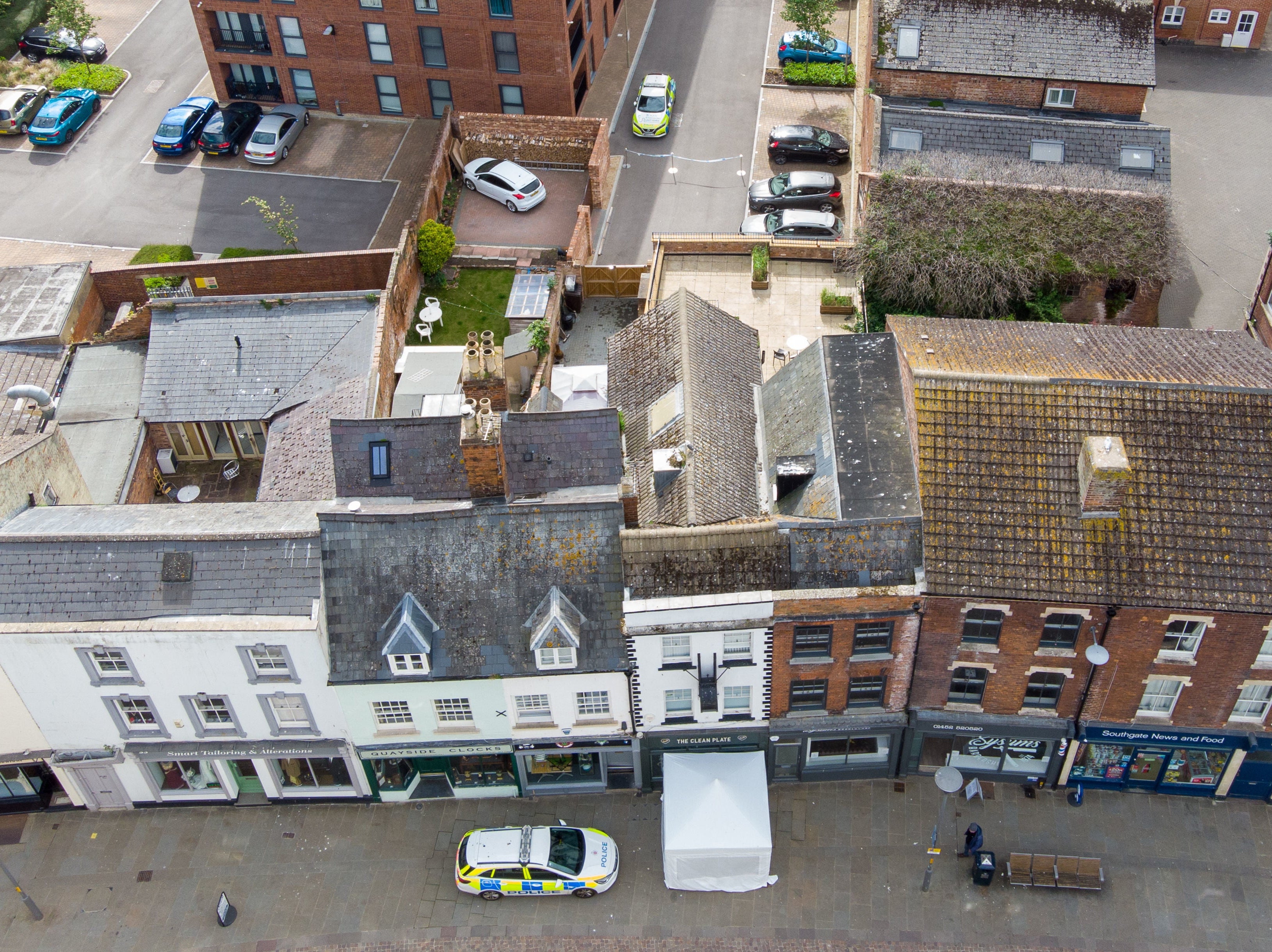 Police activity at The Clean Plate cafe in Southgate Street, Gloucester, where excavation work is to begin