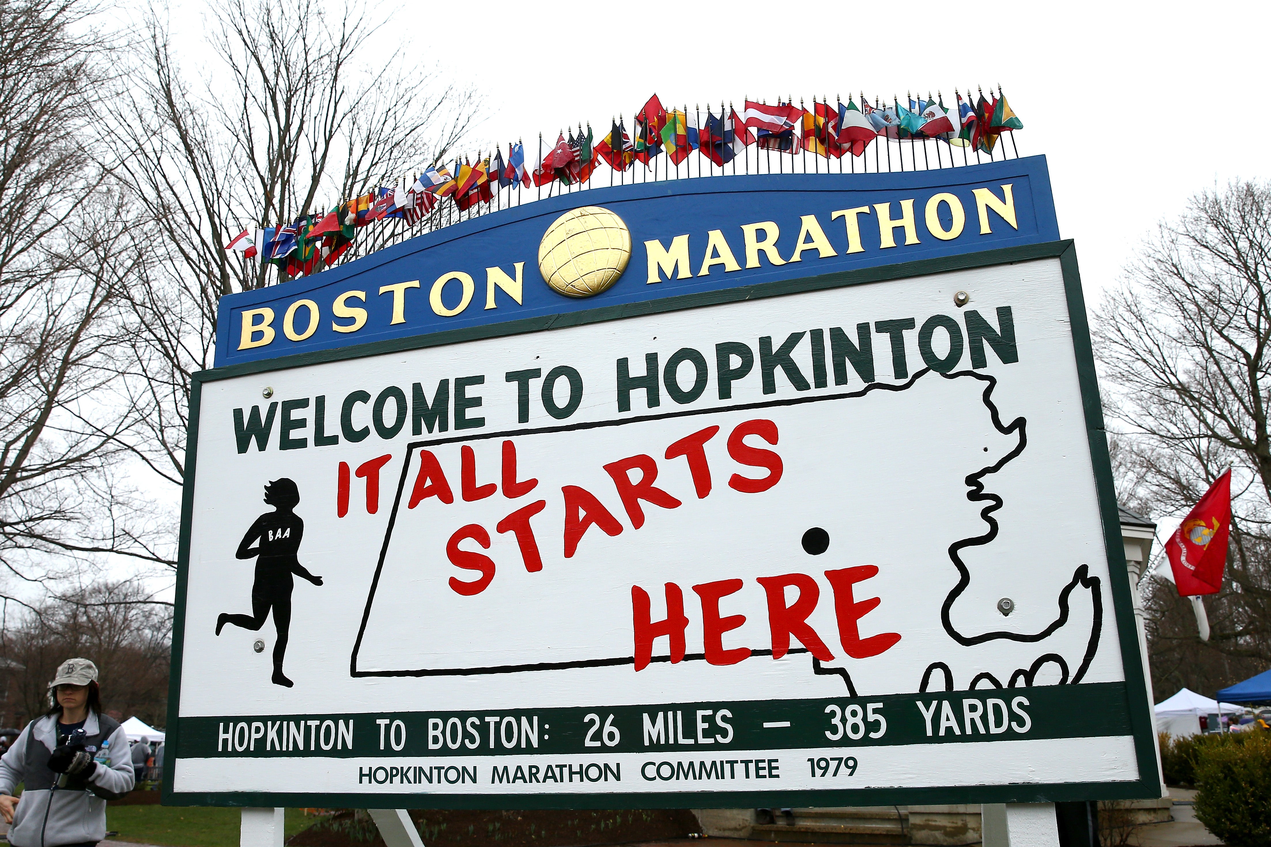 A view of a sign stating "It All Starts Here" near the start of the Boston marathaon in Hopkinton, Masachusetts, where a teen girl was found dead, hanging from a tree last month.