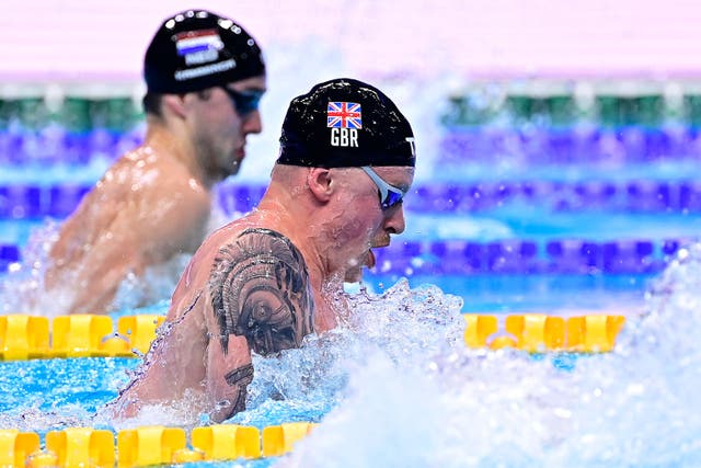 Adam Peaty storms clear to win gold