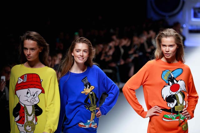 Models at the Moschino fashion show during the 2015 Fall/Winter Milan Fashion Week in Milan, Italy, 26 February 2015.