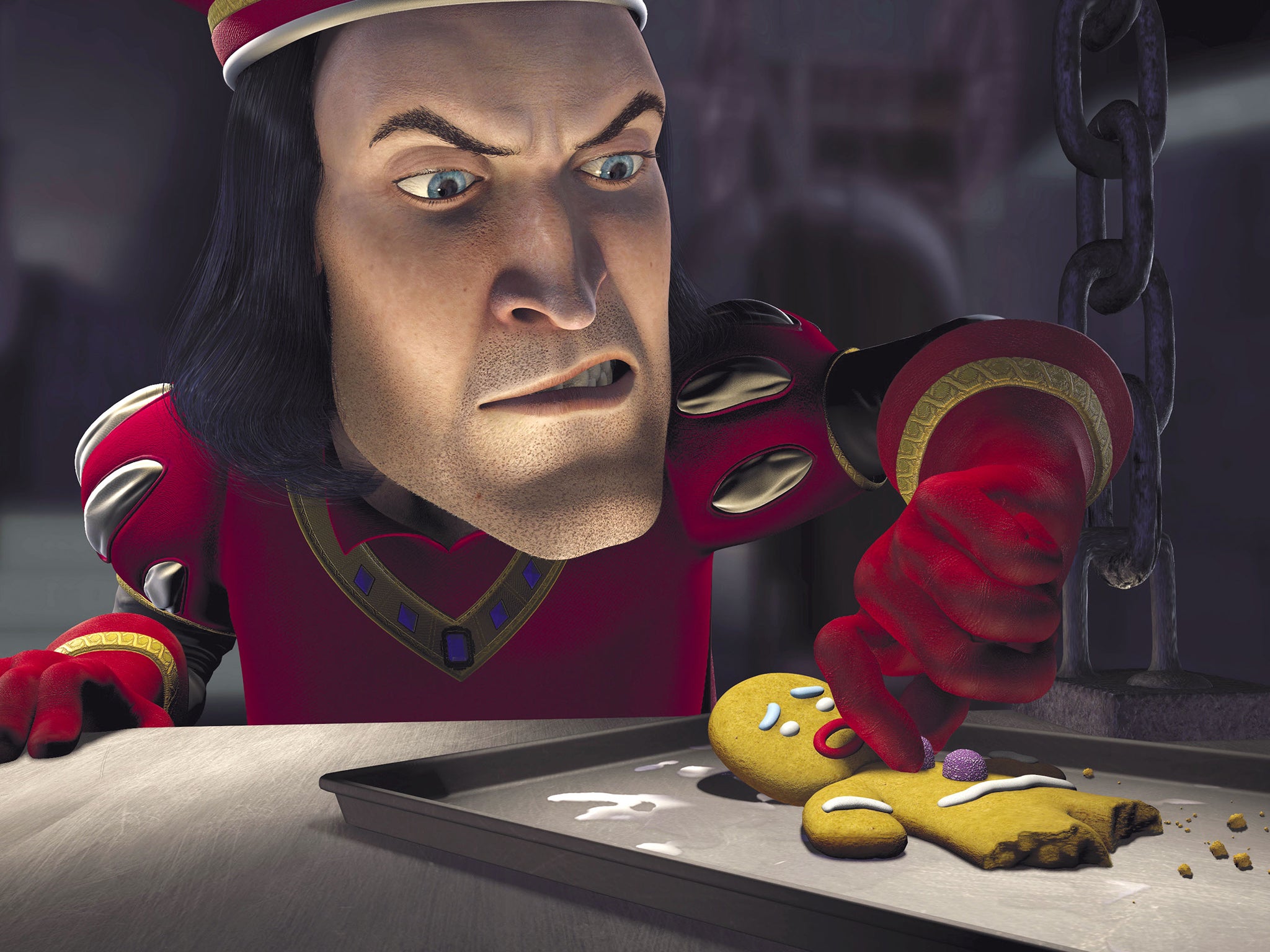 Lord Farquaad (John Lithgow) tortures a gingerbread man in Shrek