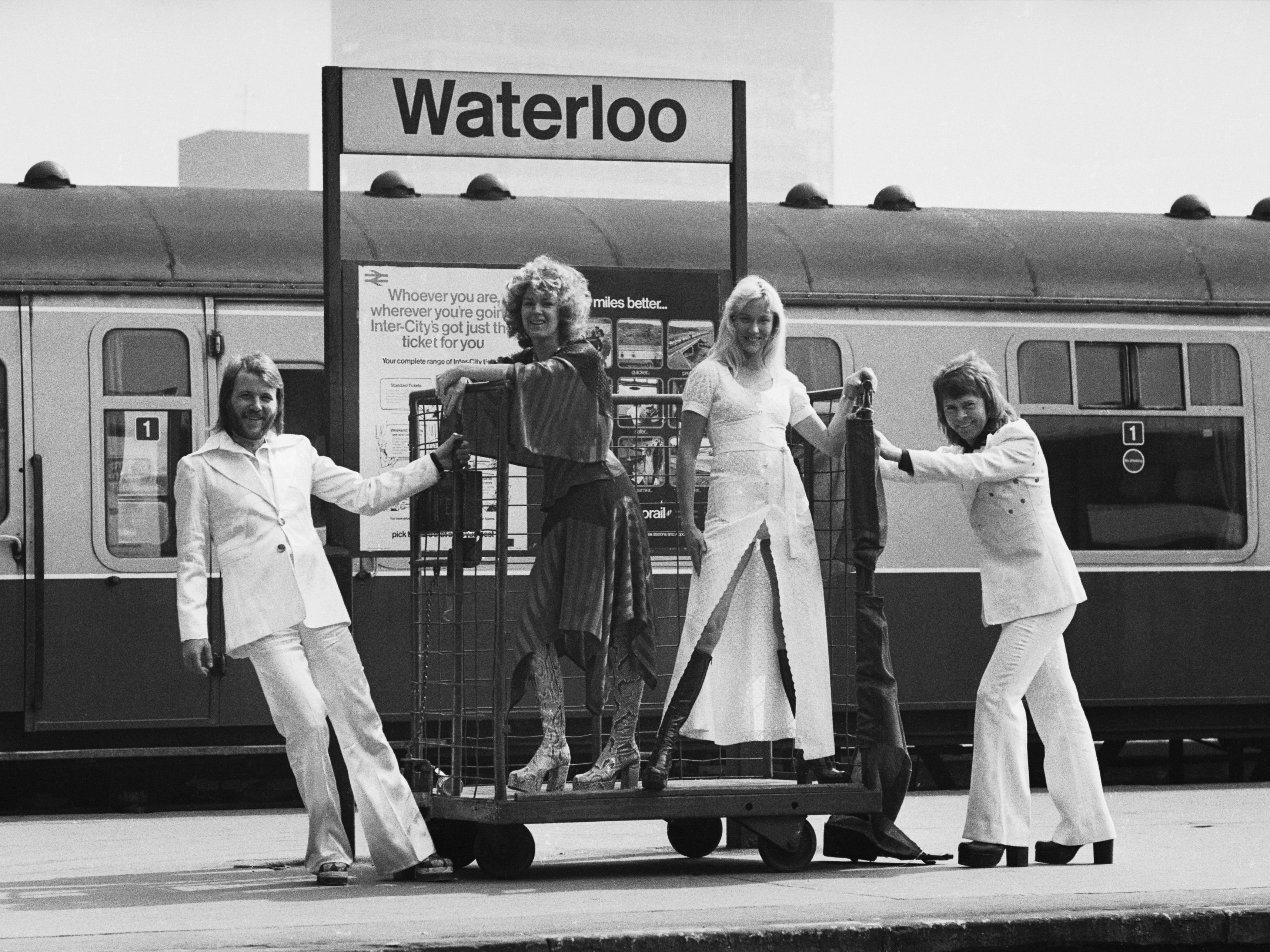Andersson, Lyngstad, Faltskog and Ulvaeus pose at Waterloo Station following their Eurovision success