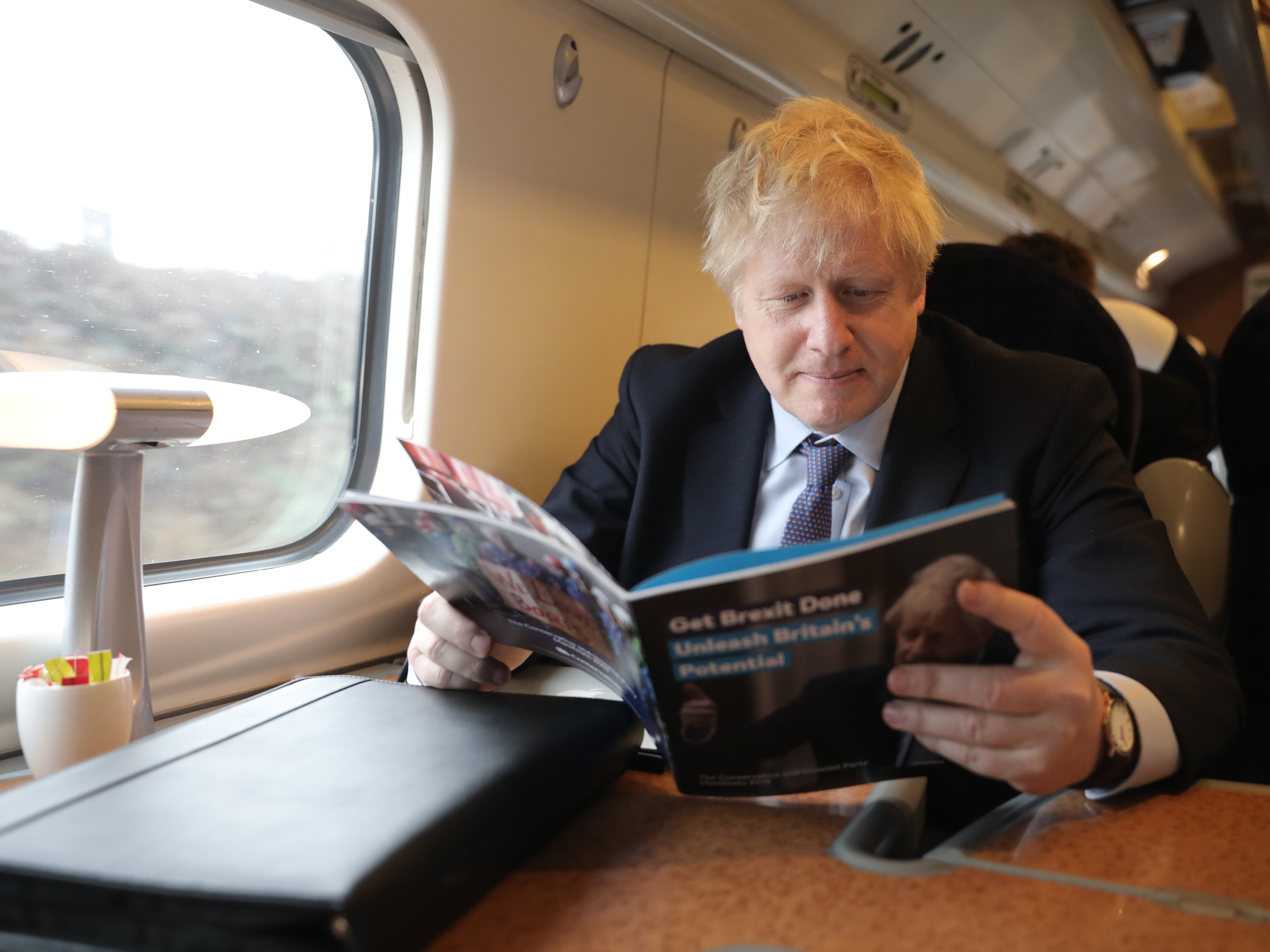 Boris Johnson enjoys his 2019 election manifesto