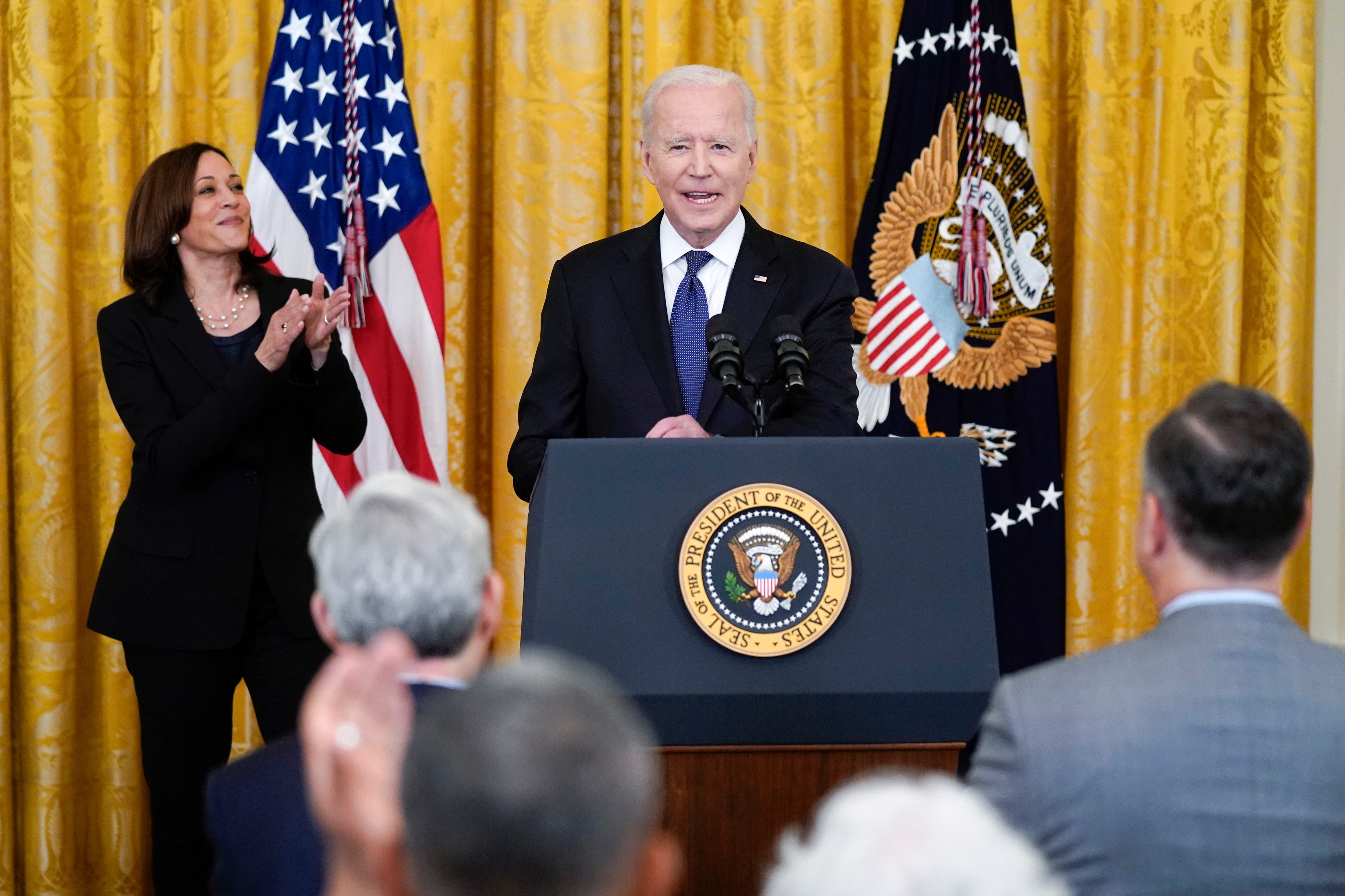 Vice President Kamala Harris applauds as President Joe Biden speaks before signing the COVID-19 Hate Crimes Act, in the East Room of the White House, Thursday, May 20, 2021