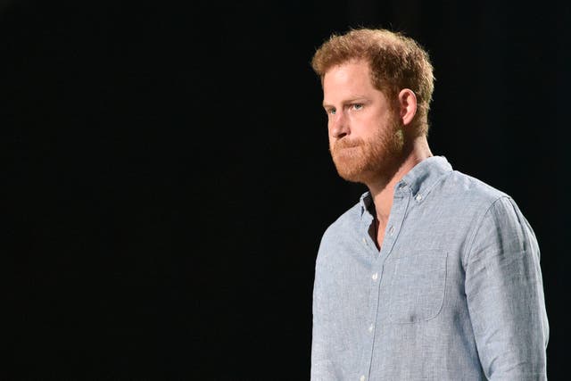 <p>Co-Chair Britain's Prince Harry, Duke of Sussex, arrives to speak onstage during the taping of the "Vax Live" fundraising concert at SoFi Stadium in Inglewood, California, on May 2, 2021.</p>