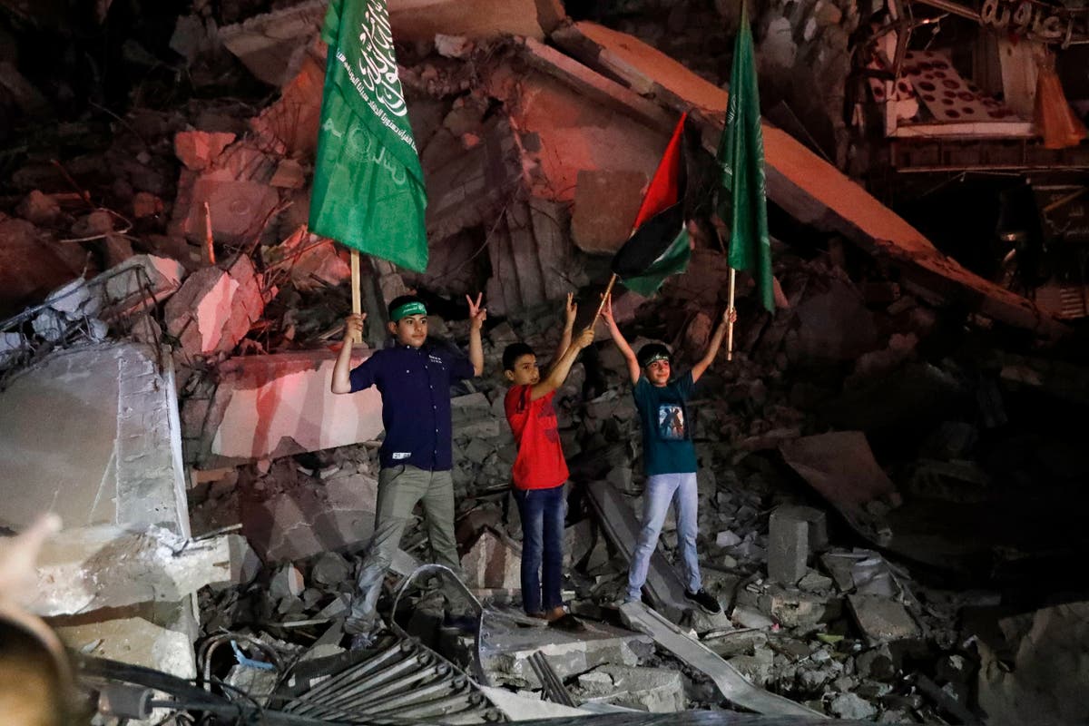 Palestinians claim victory as Gaza truce faces early test Palestinians claim victory as Gaza truce faces early test