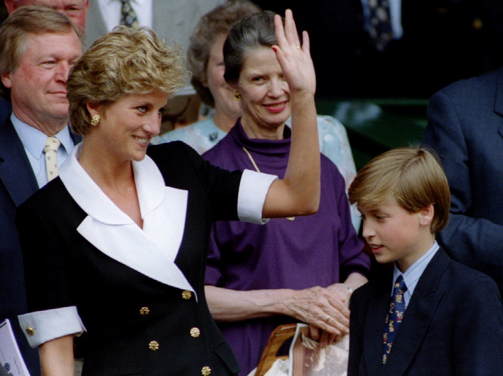 Diana, Princess of Wales, accompanied by Prince William, arrives at Wimbledon's Centre Court